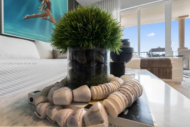 a bathroom with a granite countertop sink a mirror and a shower