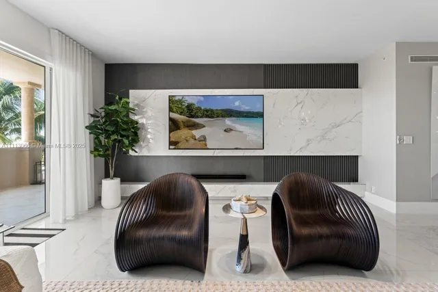 a bathroom with a toilet a sink a mirror and a shower