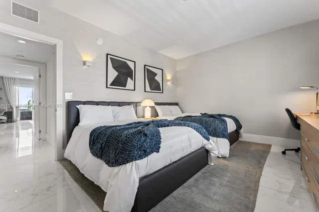 a view of balcony with furniture and potted plants