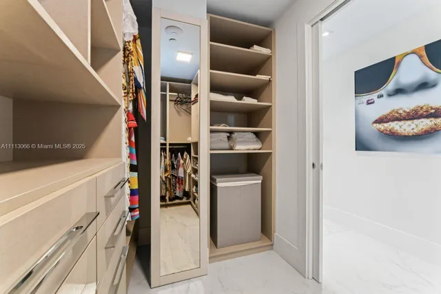 a black and white photo of a bathroom