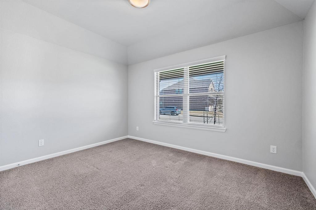 620 Shade Tree Way Princeton, TX 75407 - Photo 15 of 35 a view of an empty room with a window