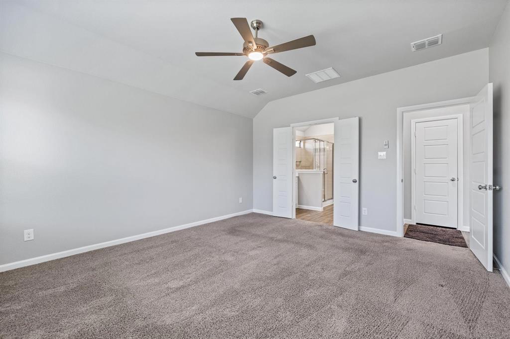 620 Shade Tree Way Princeton, TX 75407 - Photo 16 of 35 a view of a livingroom with a ceiling fan and window
