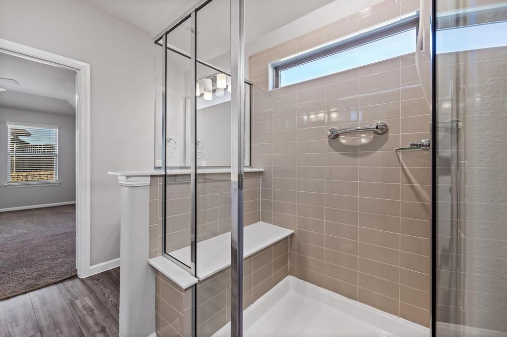 620 Shade Tree Way Princeton, TX 75407 - Photo 21 of 35 a bathroom with a shower