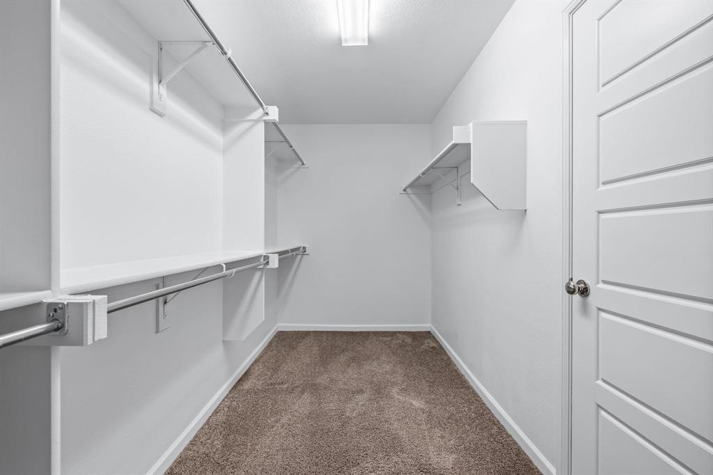 620 Shade Tree Way Princeton, TX 75407 - Photo 24 of 35 a view of a walk in closet