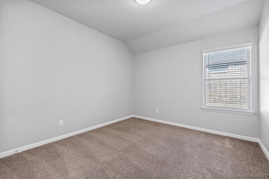 620 Shade Tree Way Princeton, TX 75407 - Photo 25 of 35 an empty room with a window