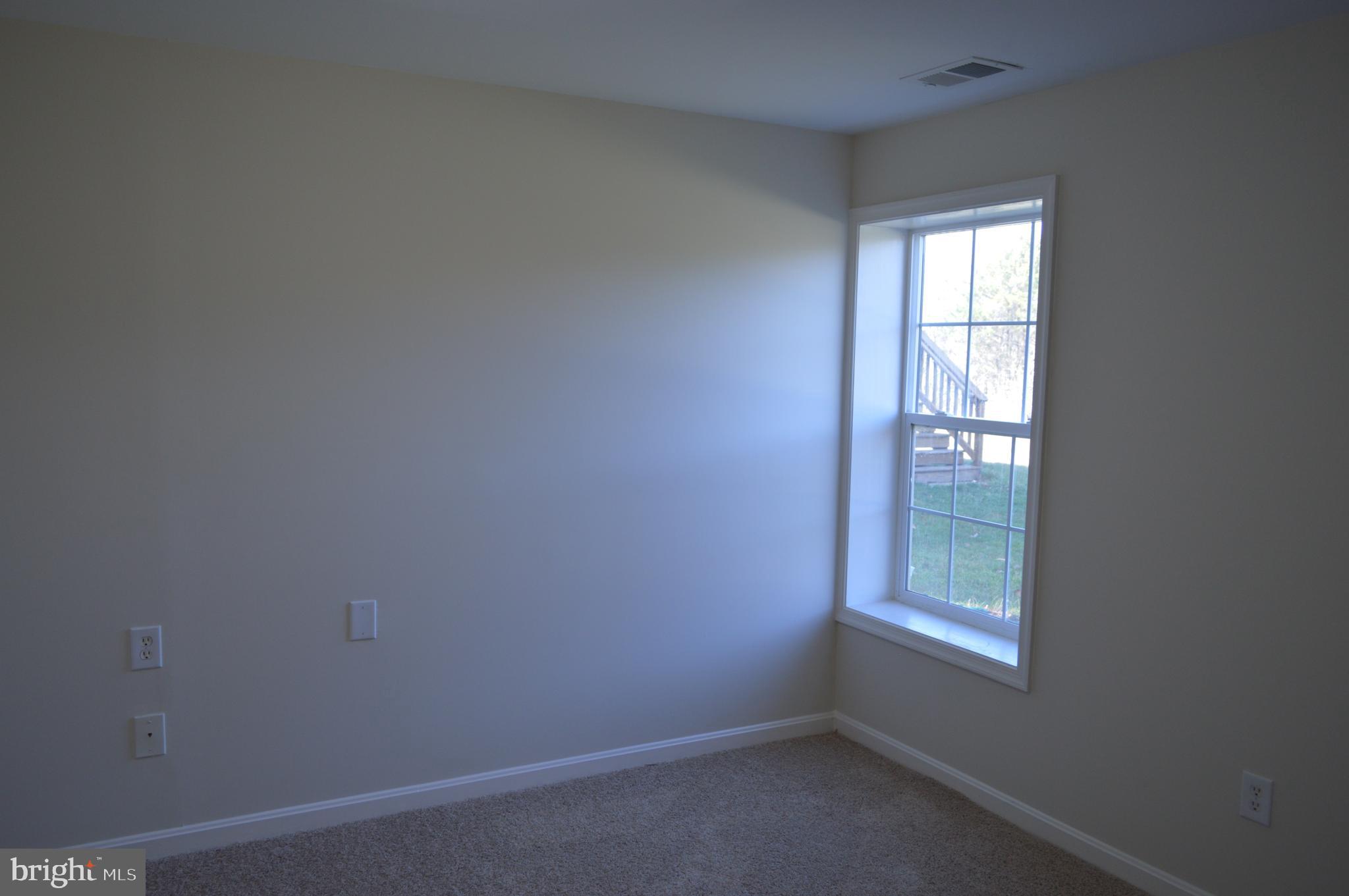 641 Kings Grant Road Culpeper, VA 22701 - Photo 35 of 39 Basement bedroom