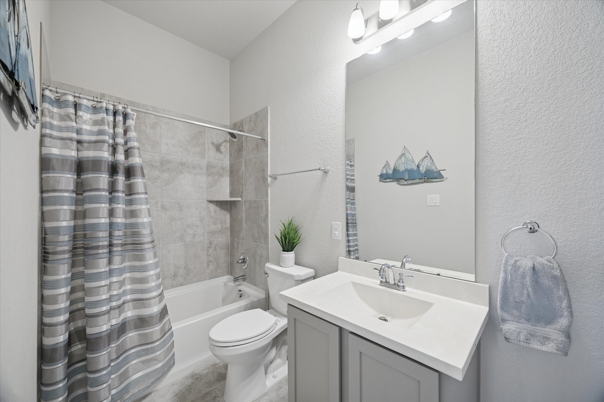 4615 Verbena Valley Way Spring, TX 77388 - Photo 21 of 25 The third bathroom means everyone has a place to wash up. Laundry room is right across the hall as well.