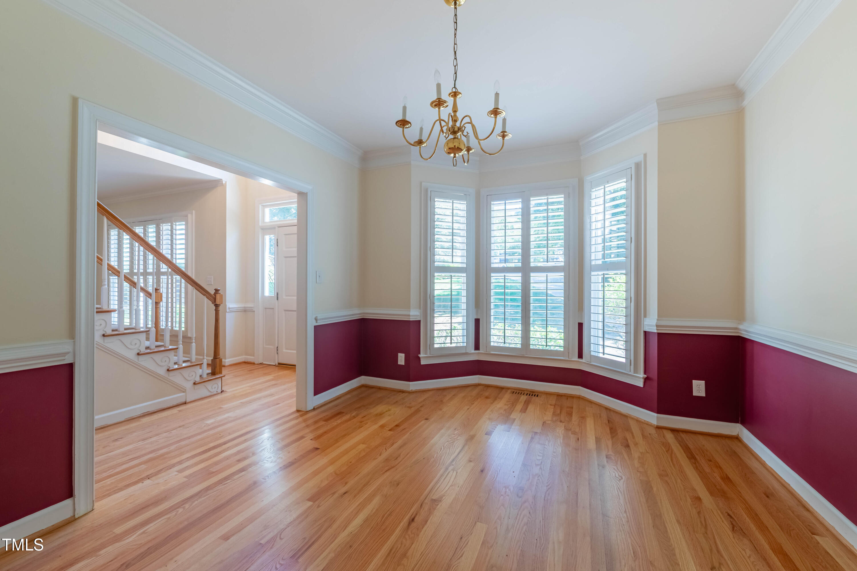 3009 Walton Heath Court Raleigh, NC 27612 - Photo 13 of 40 a view of livingroom with furniture window and wooden floor