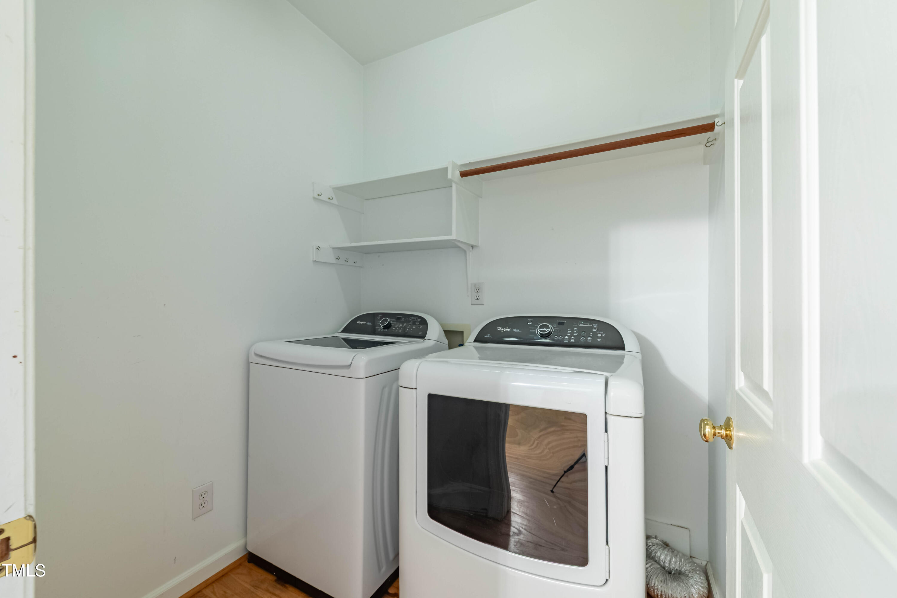 3009 Walton Heath Court Raleigh, NC 27612 - Photo 30 of 40 a utility room with dryer and washer