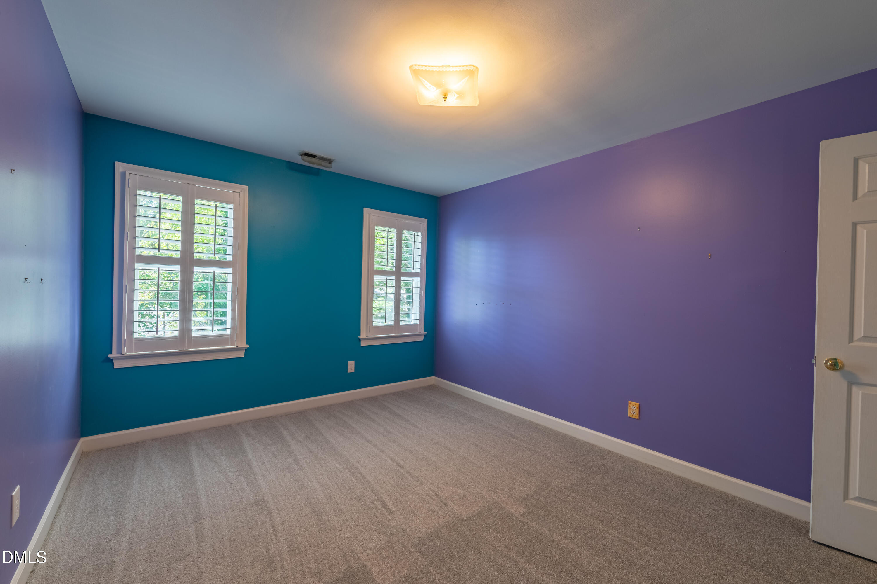 3009 Walton Heath Court Raleigh, NC 27612 - Photo 35 of 40 an empty room with windows