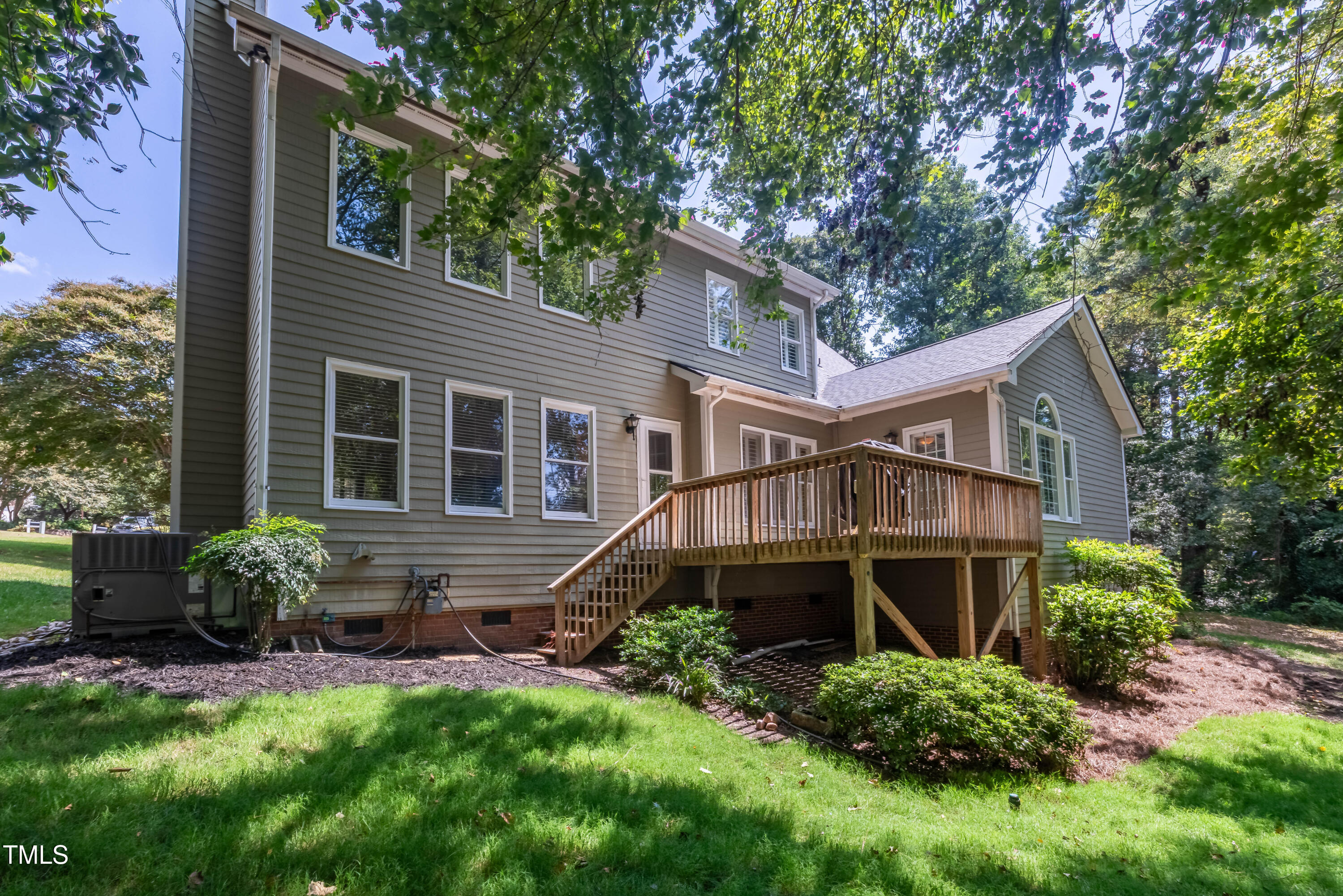 3009 Walton Heath Court Raleigh, NC 27612 - Photo 39 of 40 a front view of a house with a yard