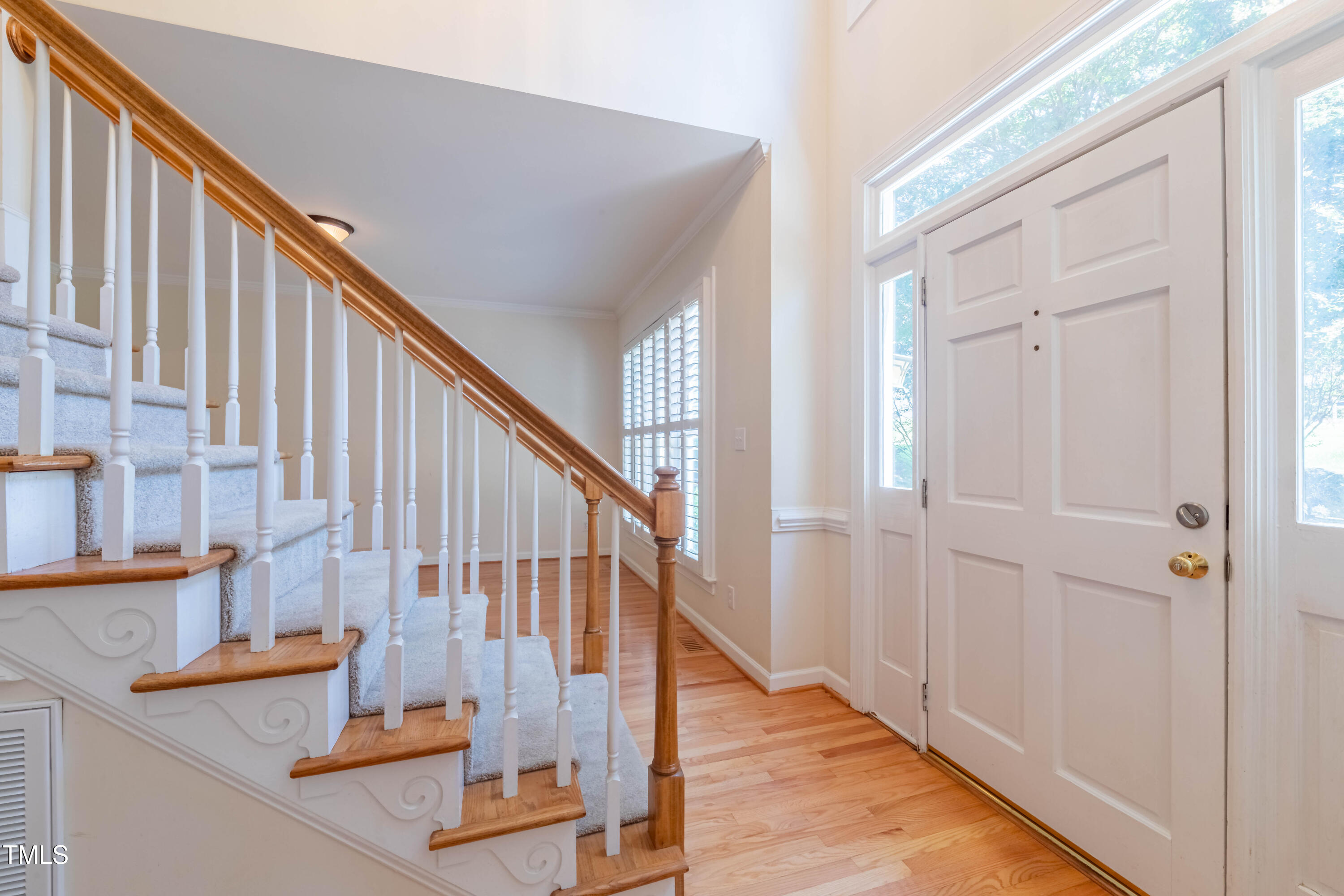 3009 Walton Heath Court Raleigh, NC 27612 - Photo 10 of 40 a view of entryway and hall with wooden floor