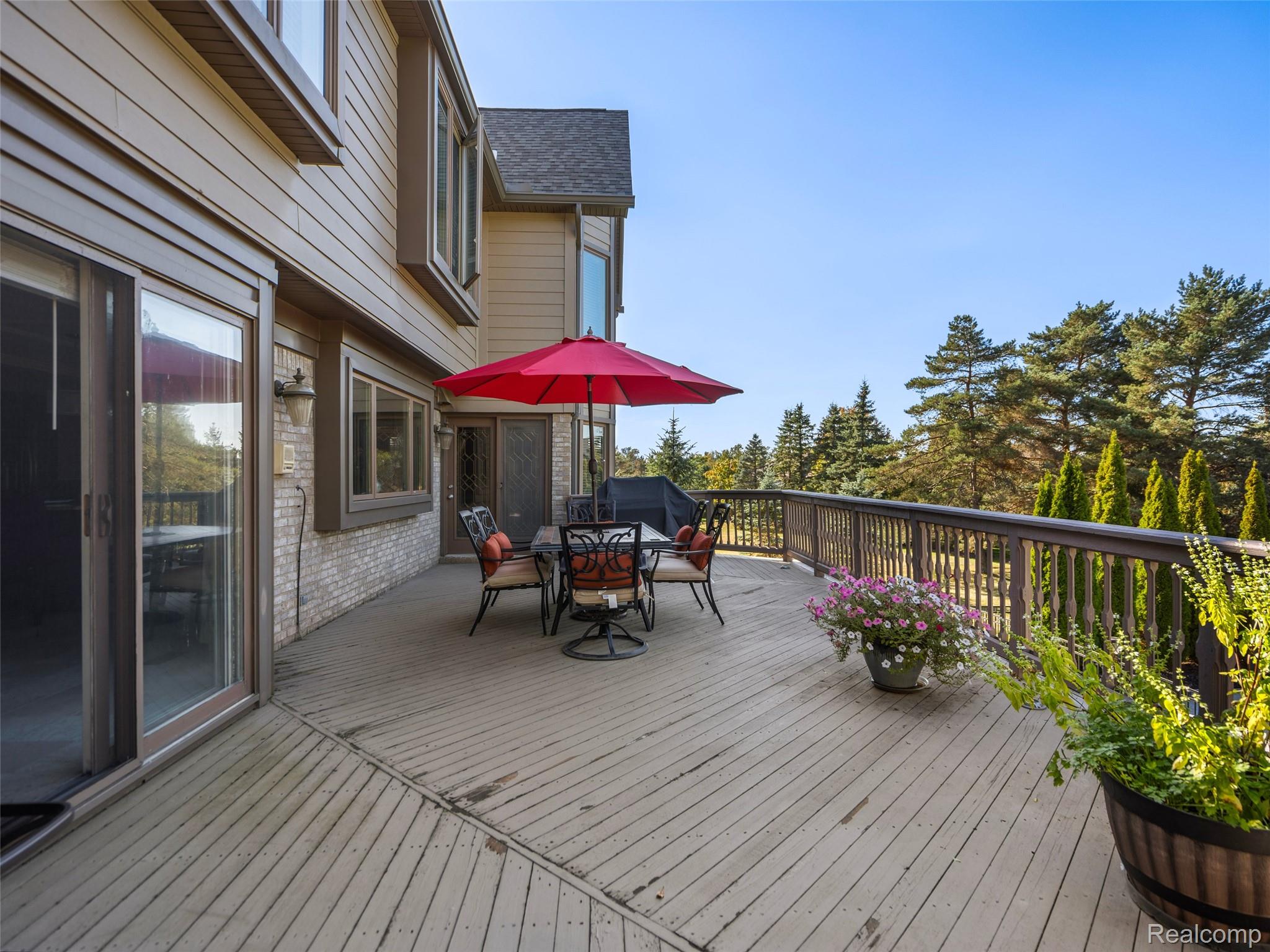 5724 Murfield Drive Rochester, MI 48306 - Photo 32 of 99 Wooden deck with outdoor dining space