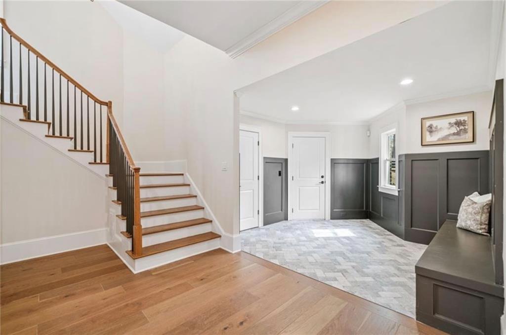310 Timberview Trail Alpharetta, GA 30004 - Photo 21 of 71 a view of a livingroom with wooden floor and staircase