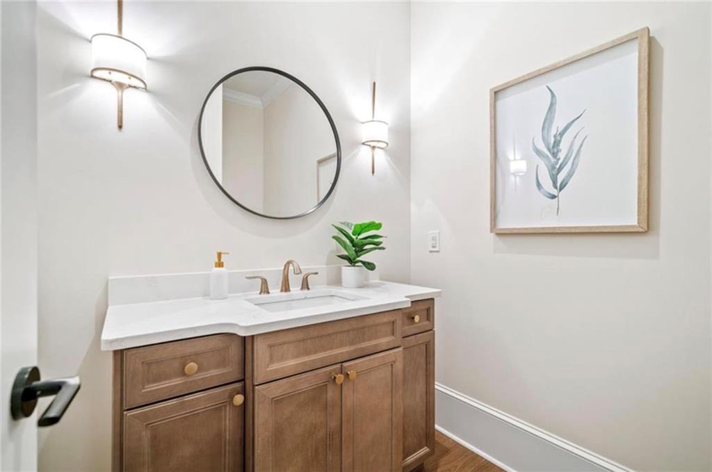 310 Timberview Trail Alpharetta, GA 30004 - Photo 23 of 71 a bathroom with a sink and a mirror