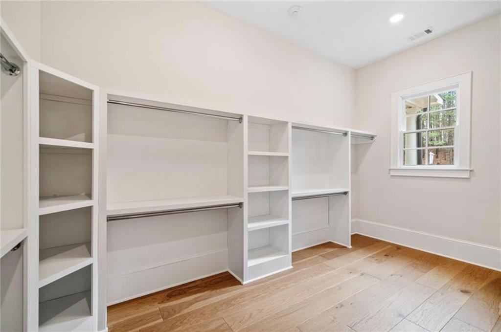 310 Timberview Trail Alpharetta, GA 30004 - Photo 29 of 71 a view of an empty room with closet area
