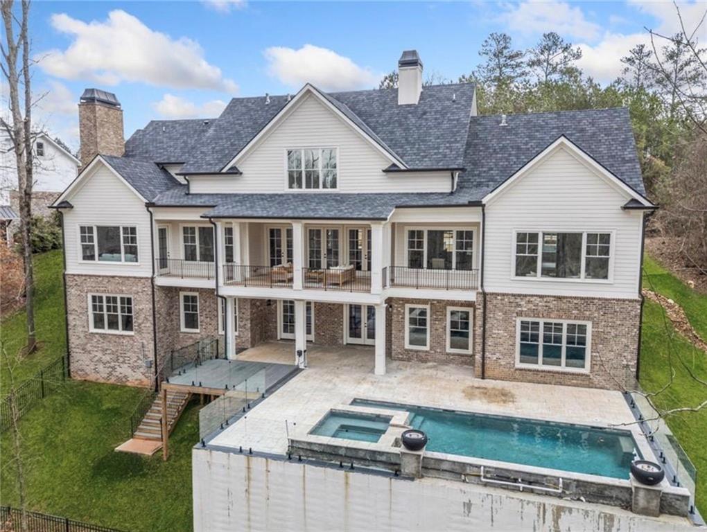 310 Timberview Trail Alpharetta, GA 30004 - Photo 64 of 71 a front view of a house with garden