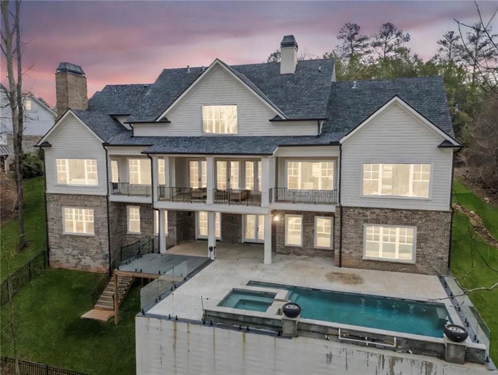 310 Timberview Trail Alpharetta, GA 30004 - Photo 65 of 71 a front view of a house with a yard