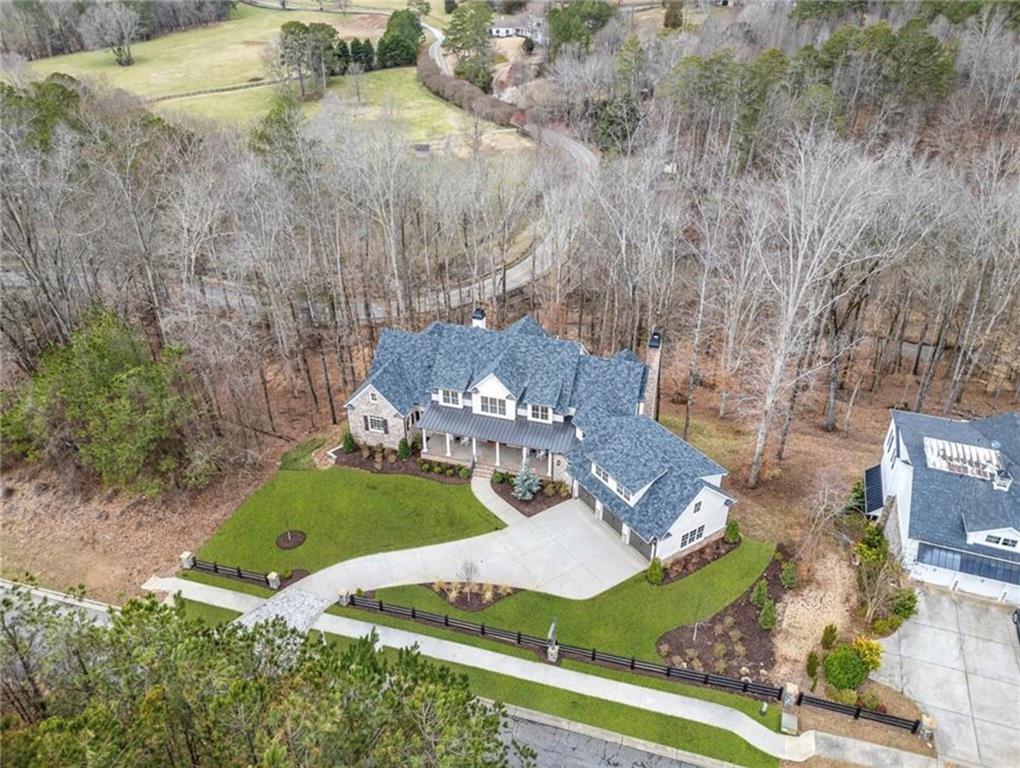 310 Timberview Trail Alpharetta, GA 30004 - Photo 66 of 71 an aerial view of a house with garden space and street view