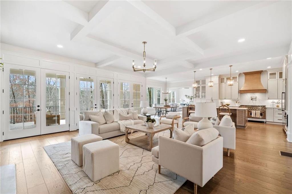 310 Timberview Trail Alpharetta, GA 30004 - Photo 10 of 71 a very nice looking living room with furniture and a chandelier