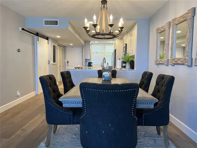 a view of a dining room with furniture