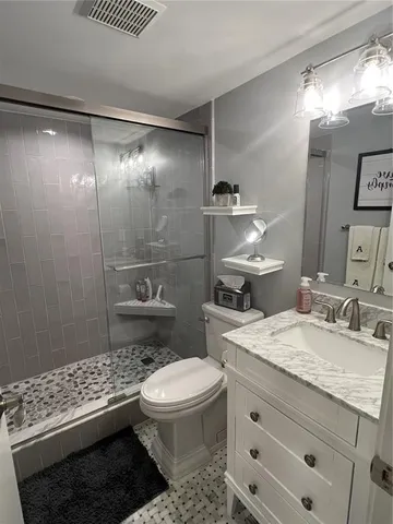 a view of balcony with furniture