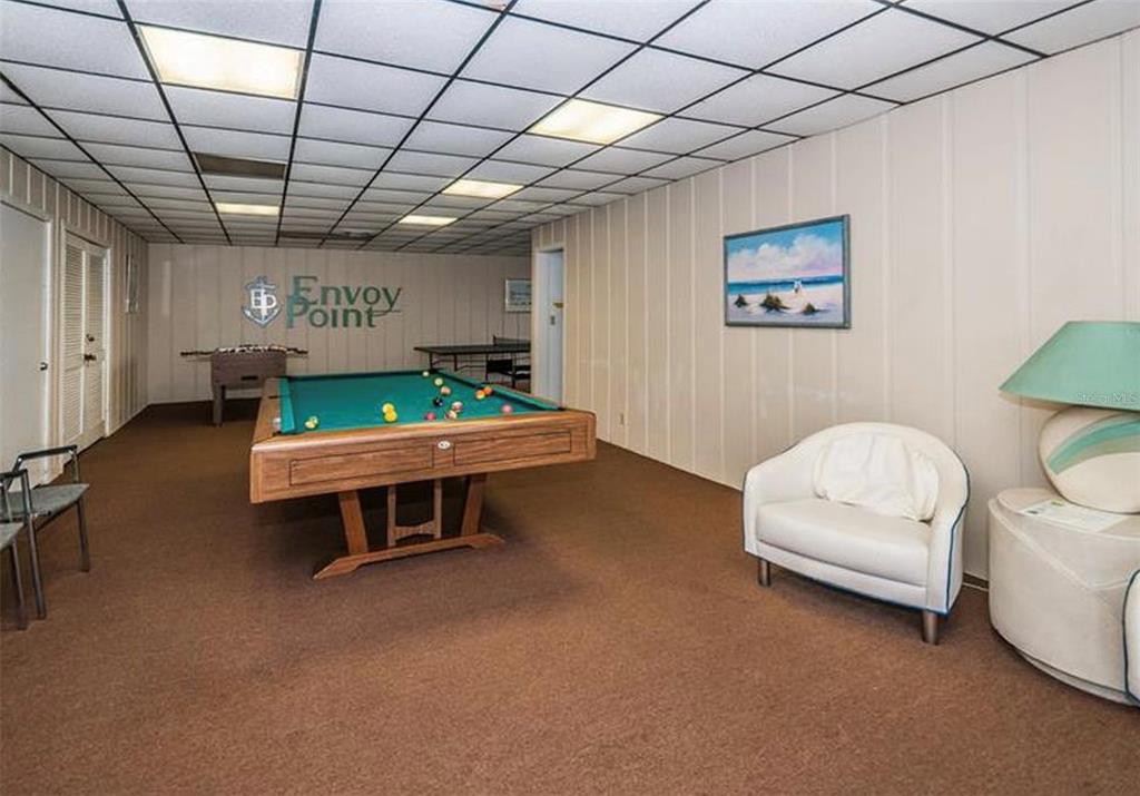 7100 Sunset Way, Unit PH5 St. Pete Beach, FL 33706 - Photo 27 of 32 a living room with furniture