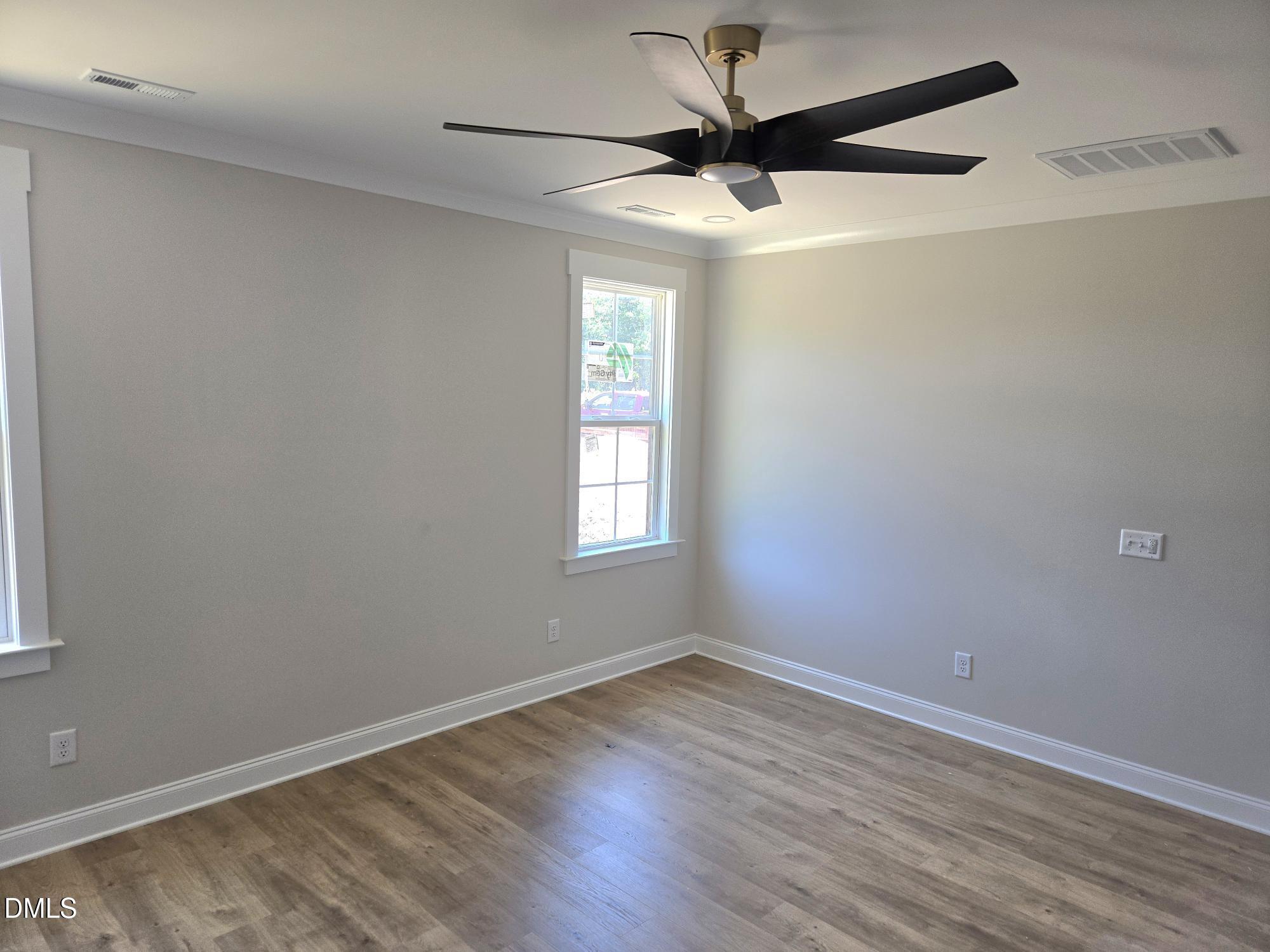 300 Avery Road Erwin, NC 28339 - Photo 26 of 38 wooden floor in an empty room