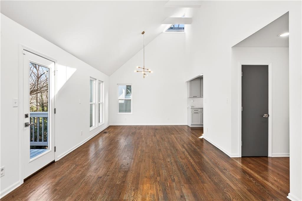 Undisclosed Address Brookhaven, GA 30319 - Photo 25 of 63 a view of a hallway with wooden floor and closet