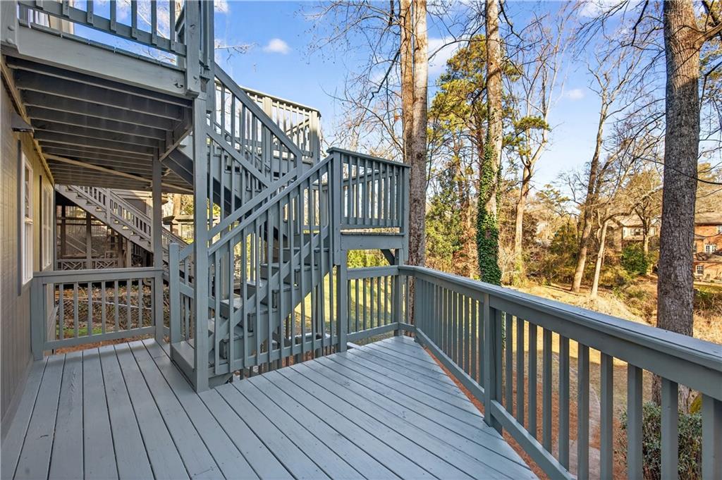 Undisclosed Address Brookhaven, GA 30319 - Photo 30 of 63 a view of balcony with wooden floor