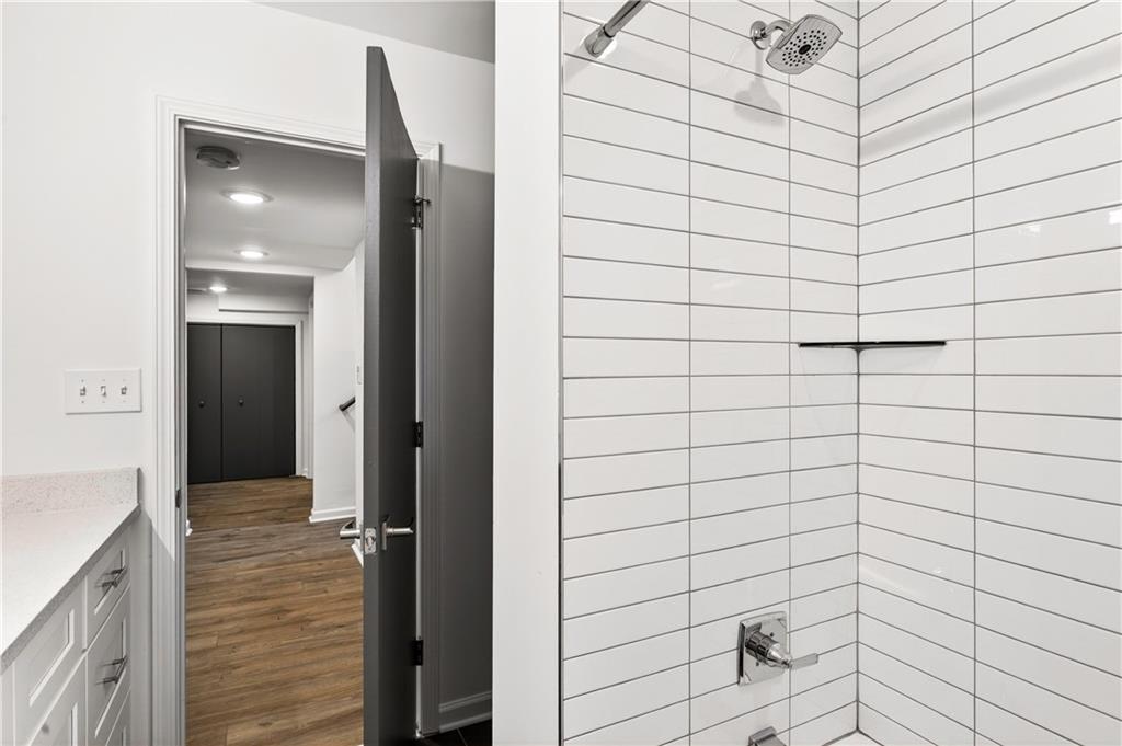 Undisclosed Address Brookhaven, GA 30319 - Photo 46 of 63 a bathroom with a shower