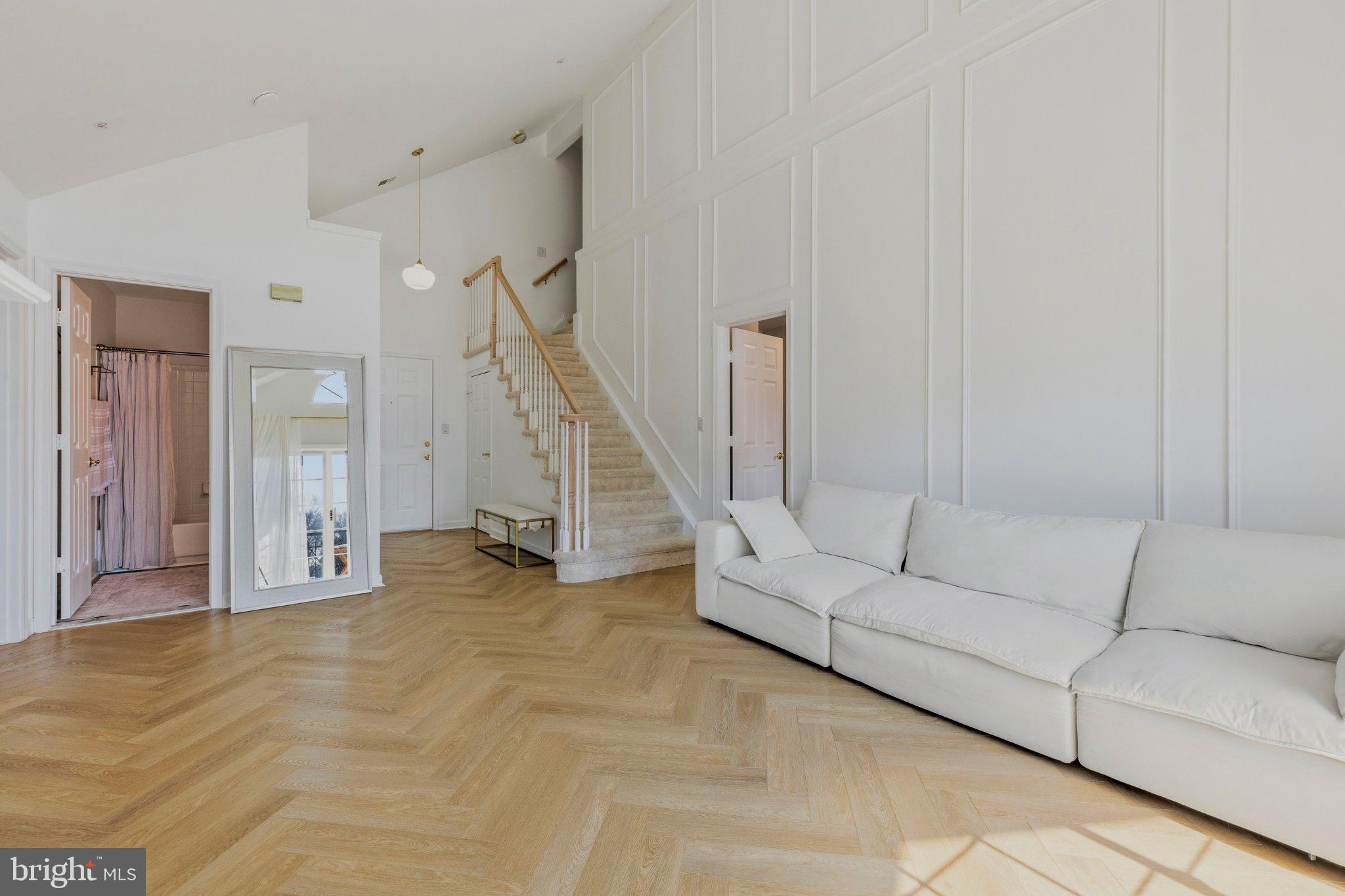 408 Ridgepoint Place, Unit 40838 Gaithersburg, MD 20878 - Photo 5 of 38 Bright and airy modern living space.