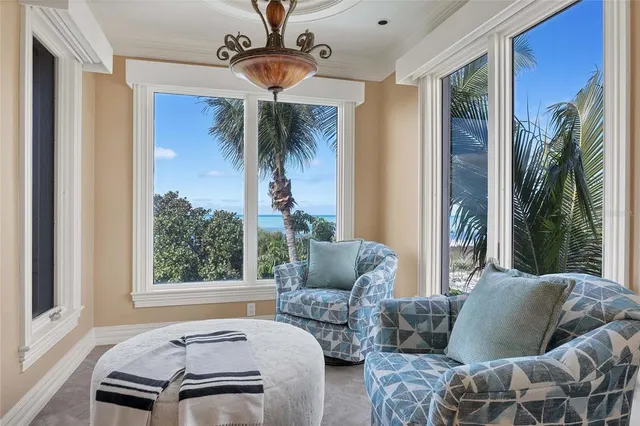 a spacious bedroom with a bed and a couch