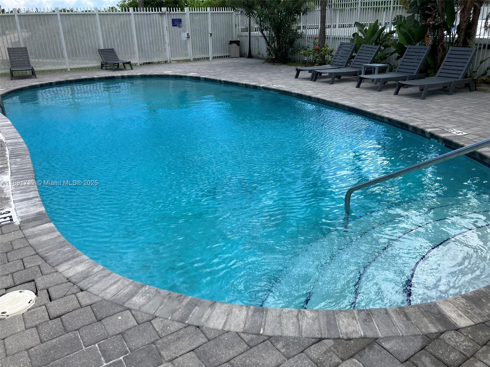 335 Ocean Drive, Unit 306 Miami Beach, FL 33139 - Photo 8 of 34 a view of a backyard