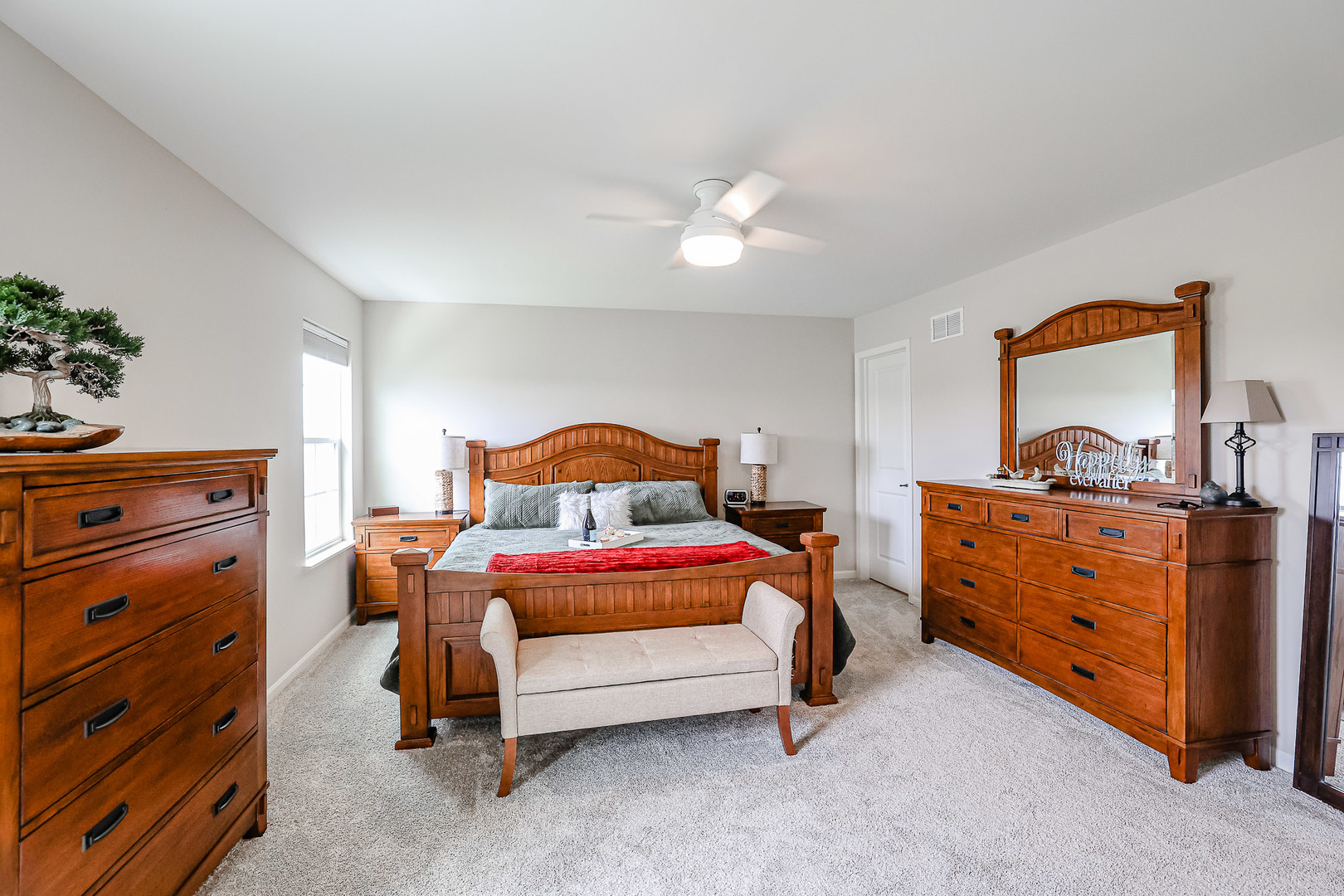 216 North Barry Road South Elgin, IL 60177 - Photo 17 of 50 a bedroom with a bed and a dresser in it
