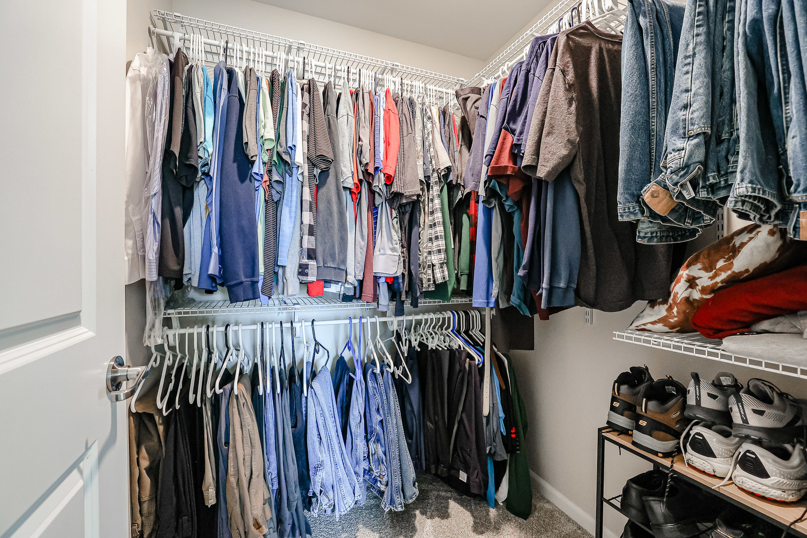 216 North Barry Road South Elgin, IL 60177 - Photo 22 of 50 a view of walk in closet with clothes