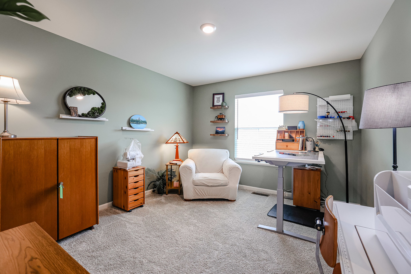 216 North Barry Road South Elgin, IL 60177 - Photo 24 of 50 a living room with furniture a window and a lamp