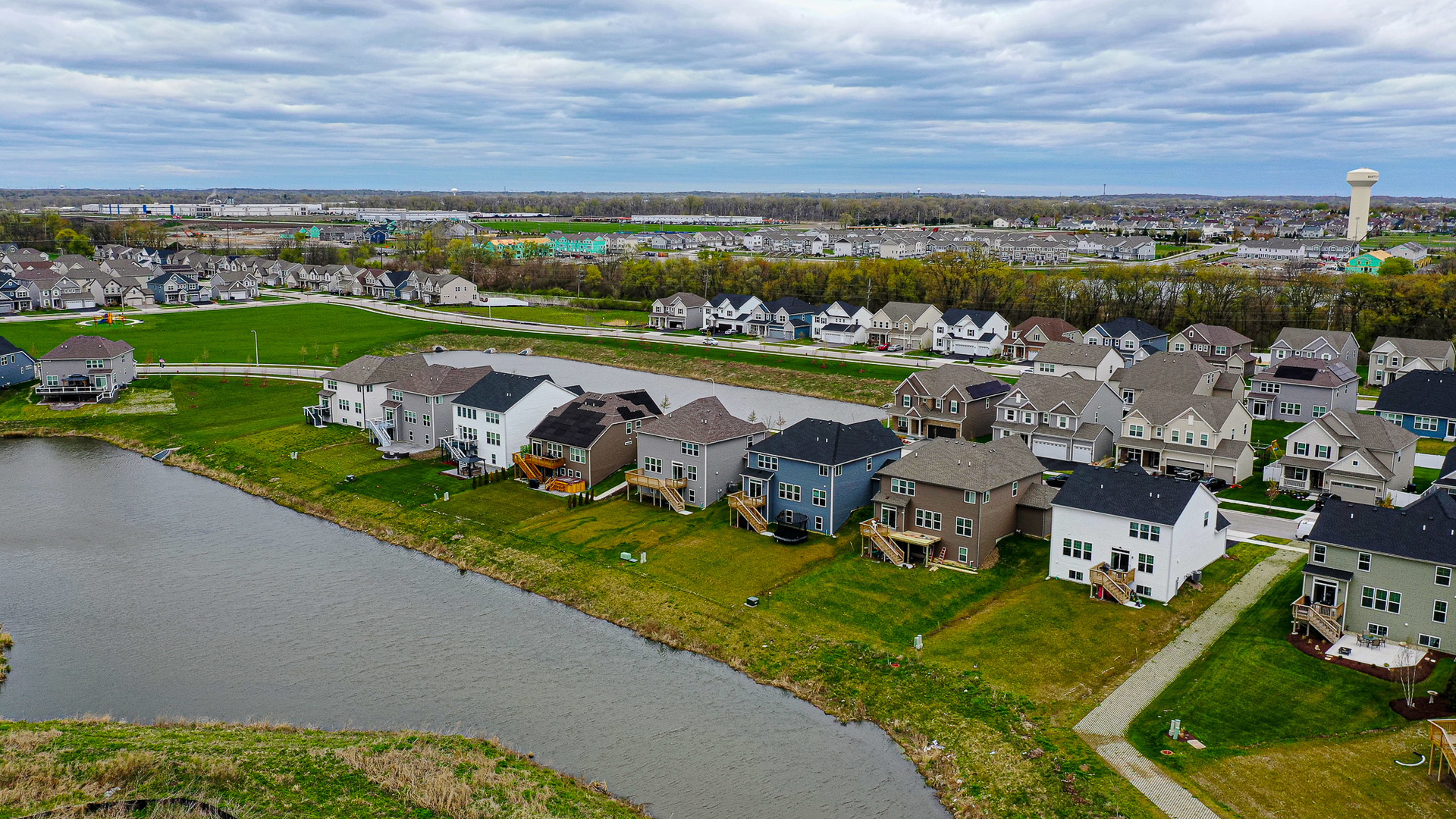 216 North Barry Road South Elgin, IL 60177 - Photo 47 of 50 an aerial view of a house with a garden and lake view