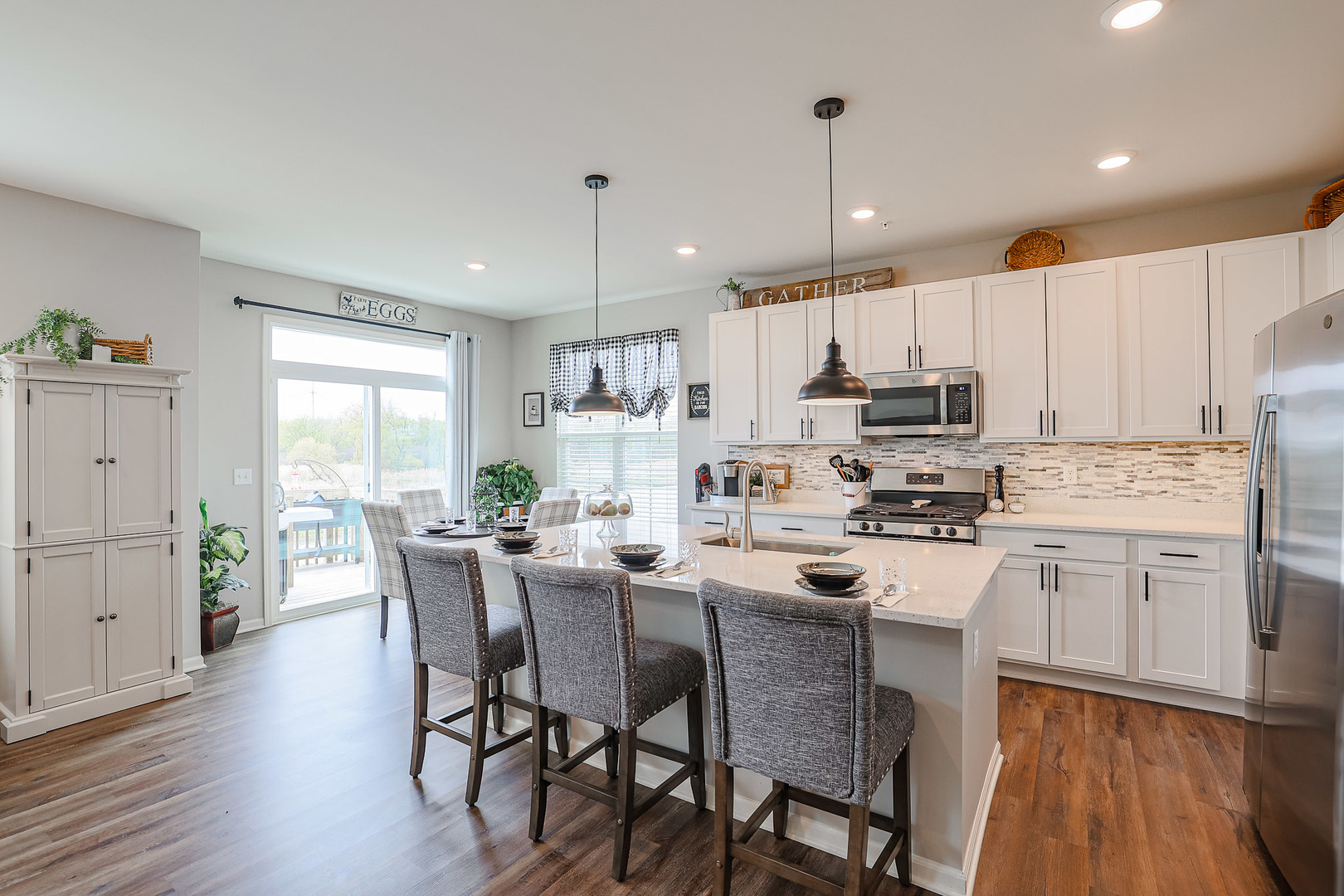 216 North Barry Road South Elgin, IL 60177 - Photo 7 of 50 a kitchen with appliances a sink a counter top space and cabinets