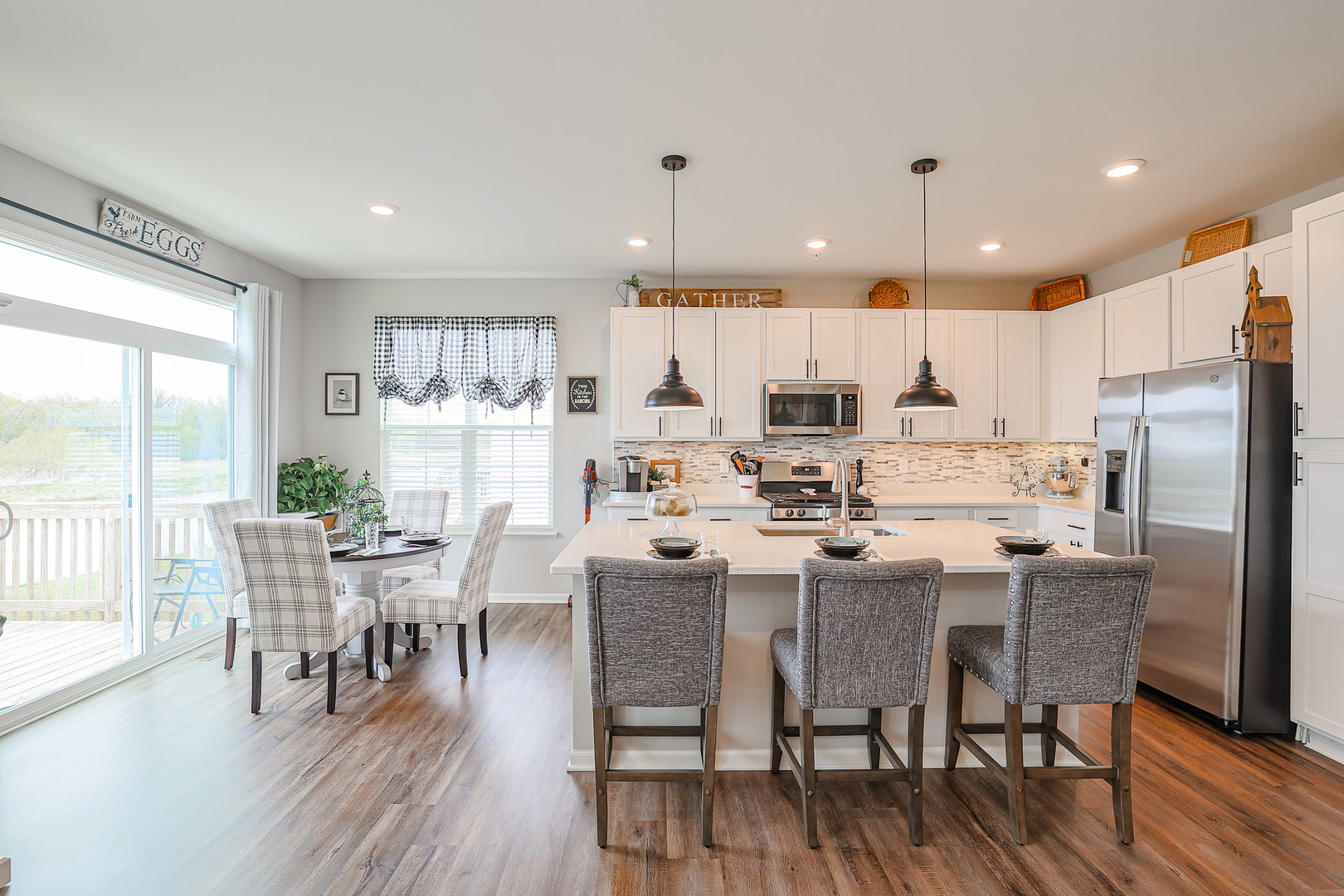 216 North Barry Road South Elgin, IL 60177 - Photo 8 of 50 a view of a dining room with furniture window and wooden floor