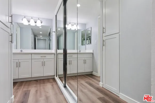 a view of a kitchen from the hallway