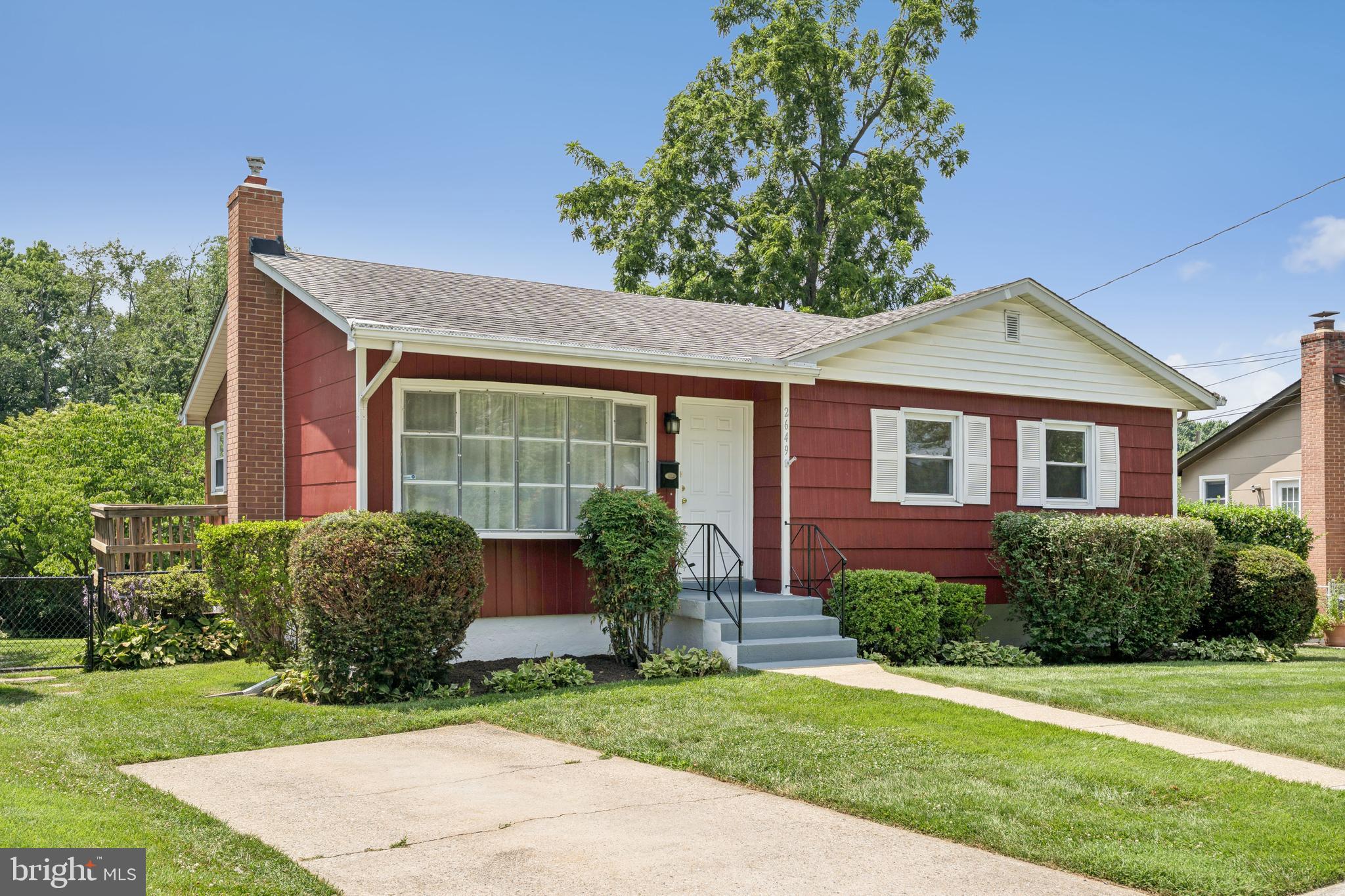 2649 Cory Terrace Silver Spring, MD 20902 - Photo 1 of 26 a front view of a house with garden