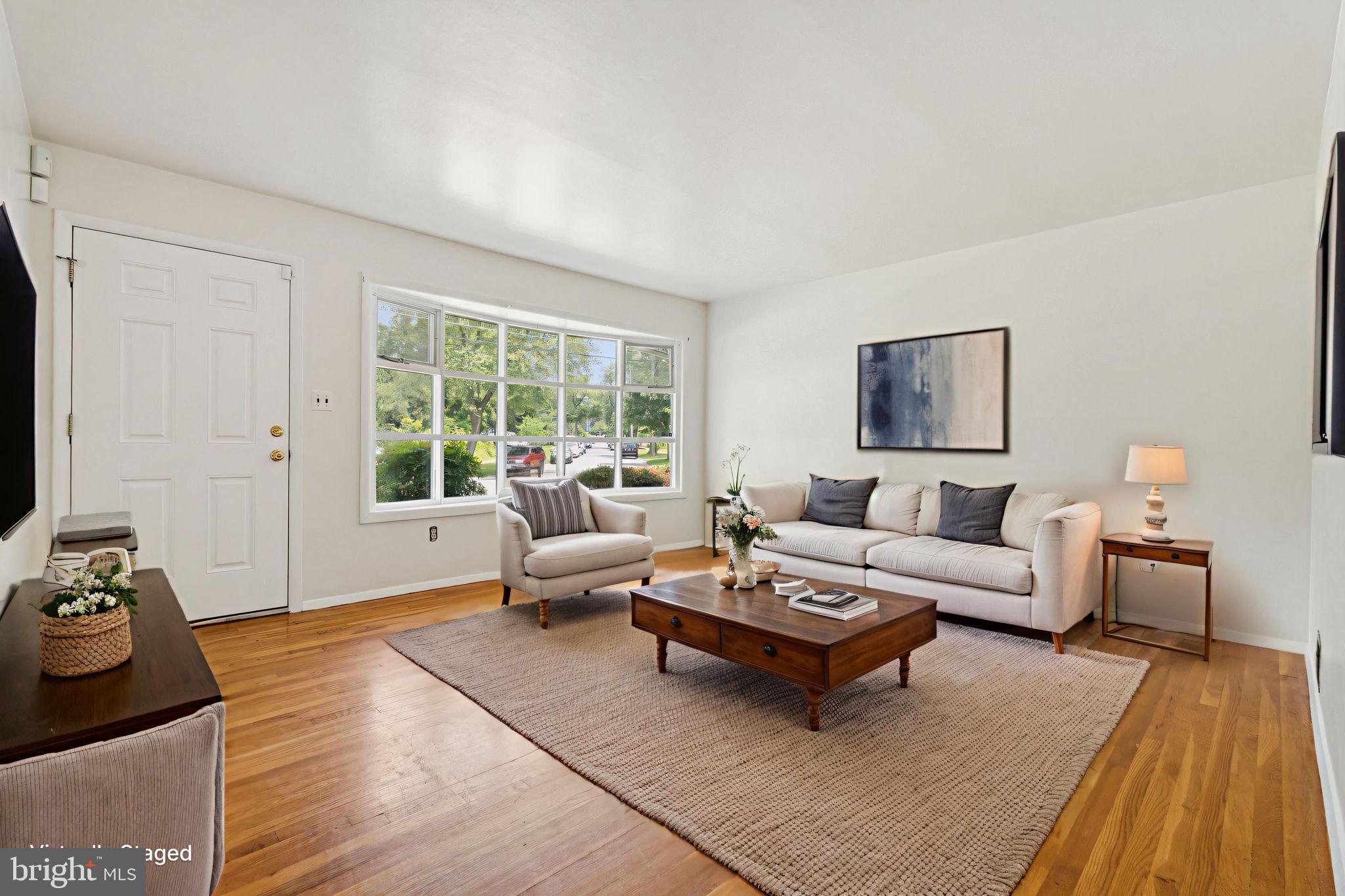 2649 Cory Terrace Silver Spring, MD 20902 - Photo 3 of 26 a living room with furniture and a large window
