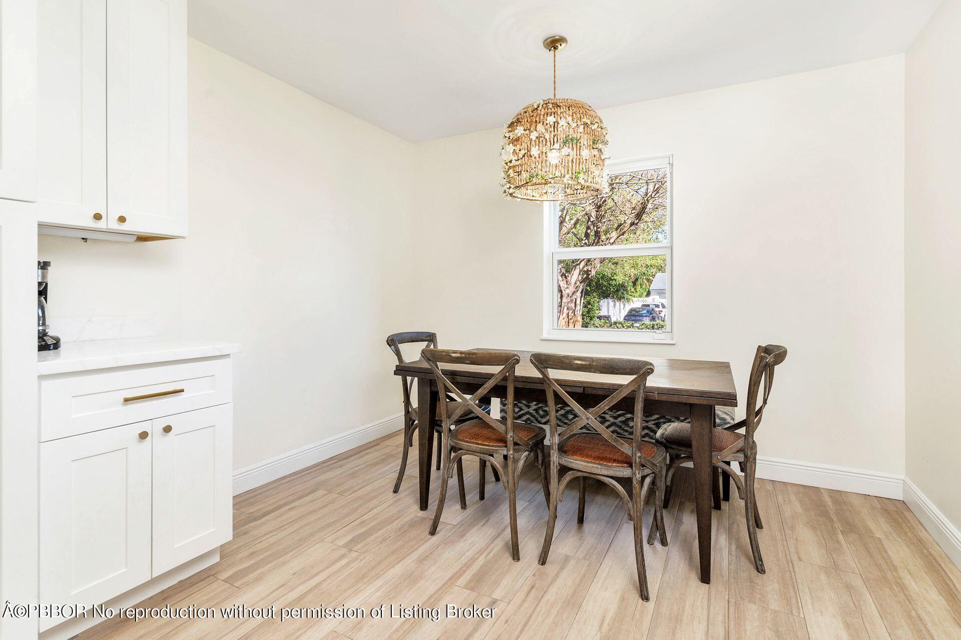 356 Potter Road West Palm Beach, FL 33405 - Photo 11 of 24 a view of a dining room with furniture window and outside view