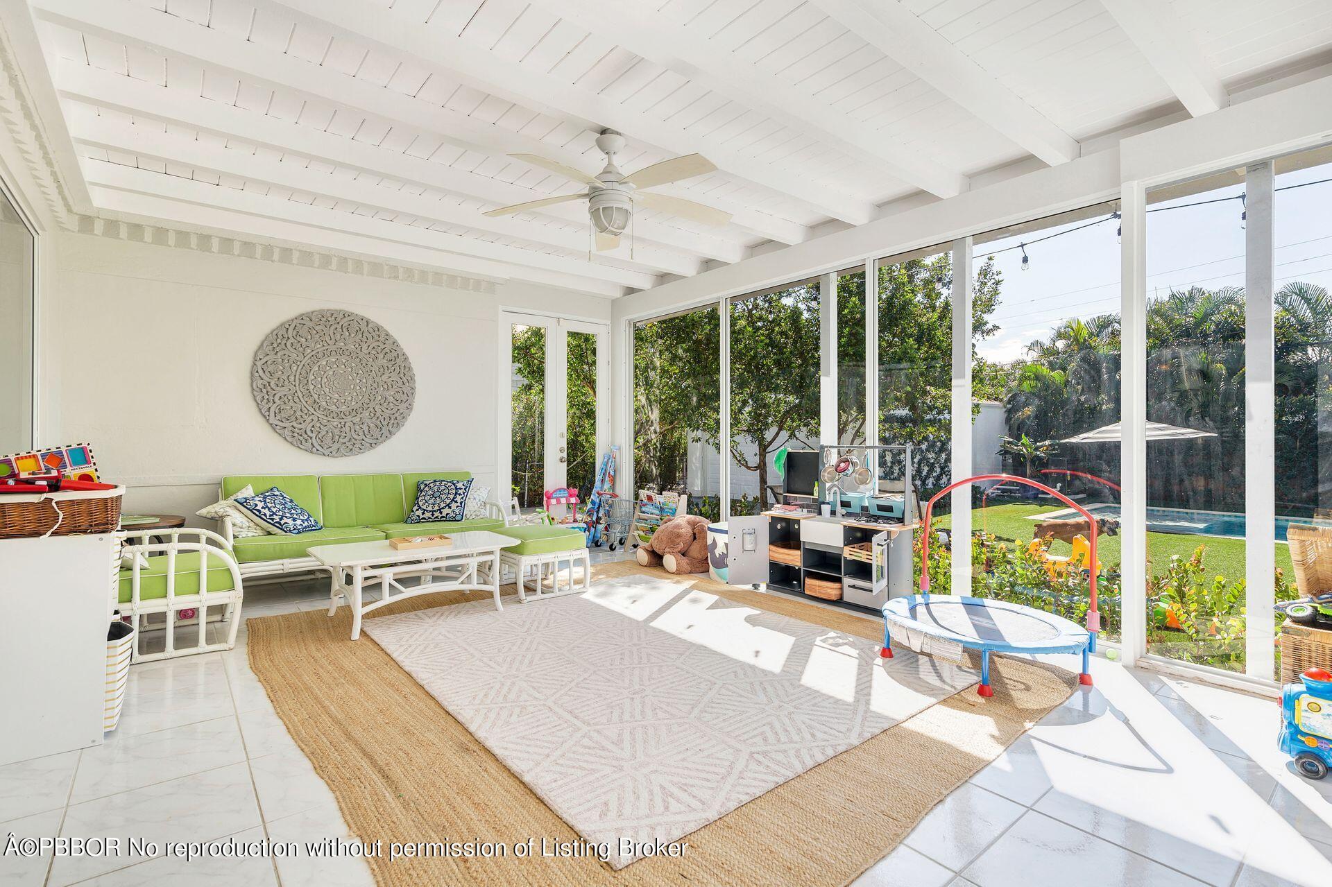 356 Potter Road West Palm Beach, FL 33405 - Photo 12 of 24 a living room with furniture and a large window