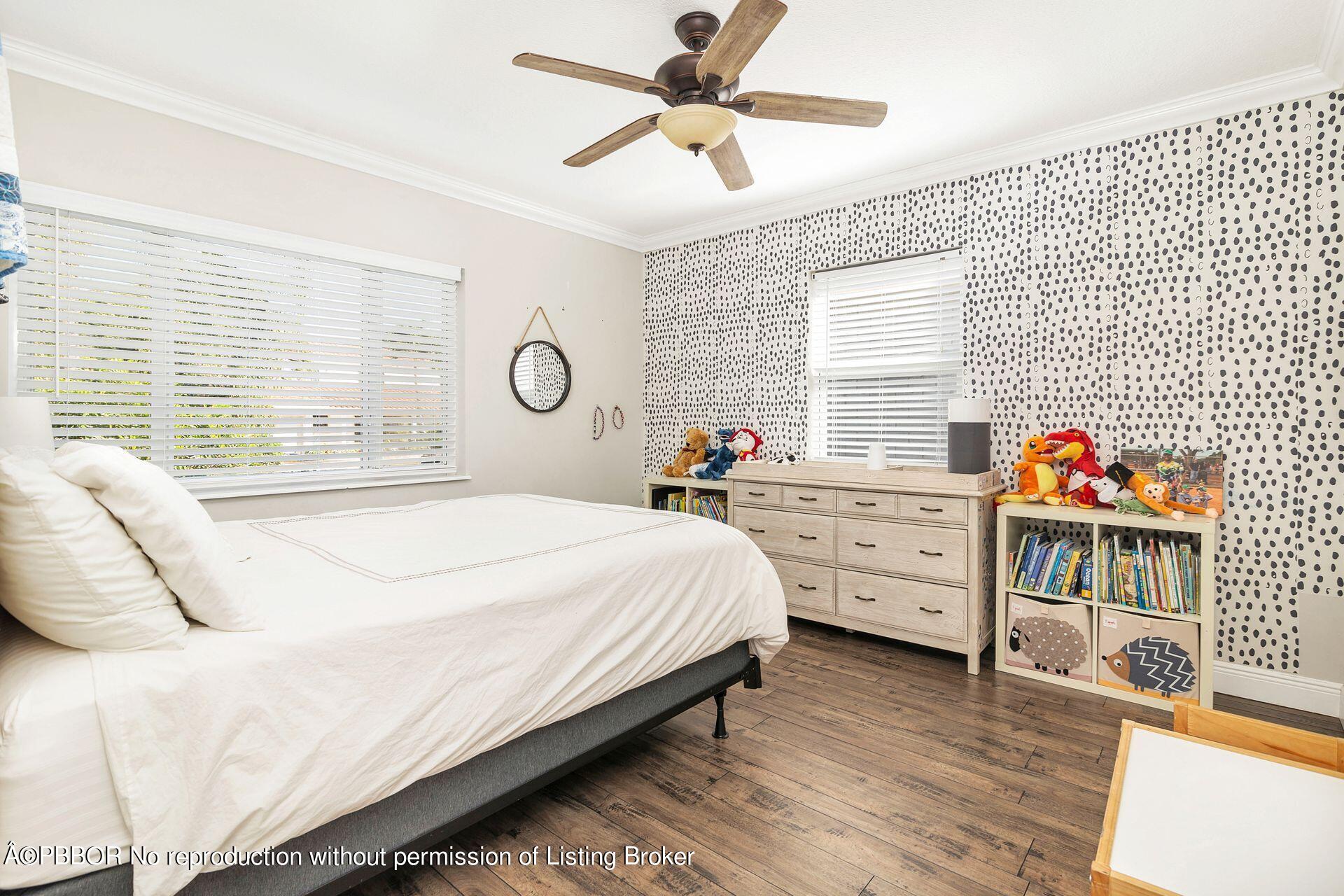 356 Potter Road West Palm Beach, FL 33405 - Photo 15 of 24 a bedroom with a bed and a dresser