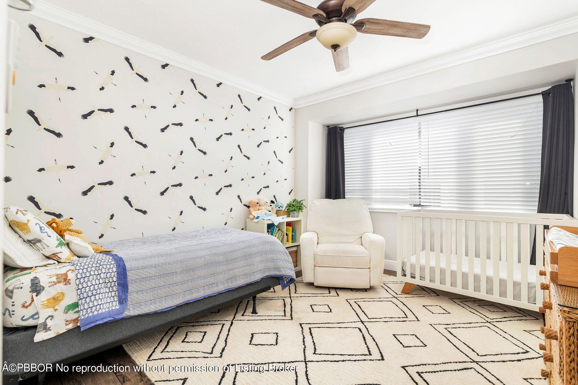 356 Potter Road West Palm Beach, FL 33405 - Photo 17 of 24 a bedroom with a bed and a window