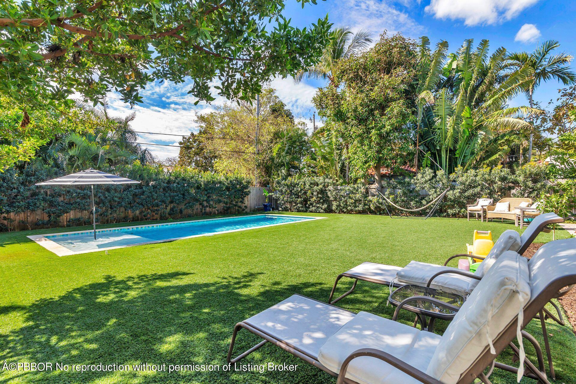 356 Potter Road West Palm Beach, FL 33405 - Photo 19 of 24 a view of a backyard with swimming pool