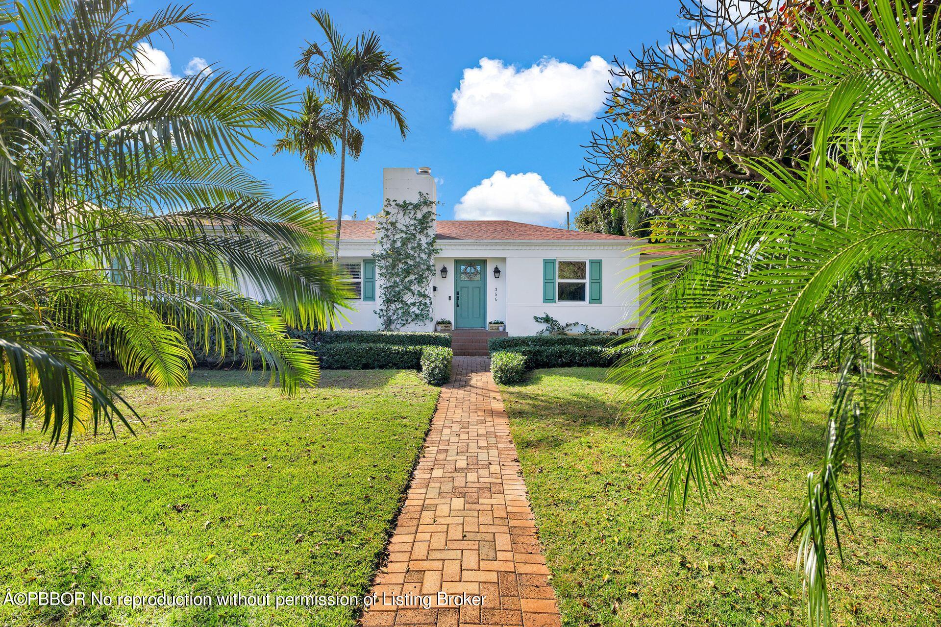 356 Potter Road West Palm Beach, FL 33405 - Photo 2 of 24 a front view of a house with a yard
