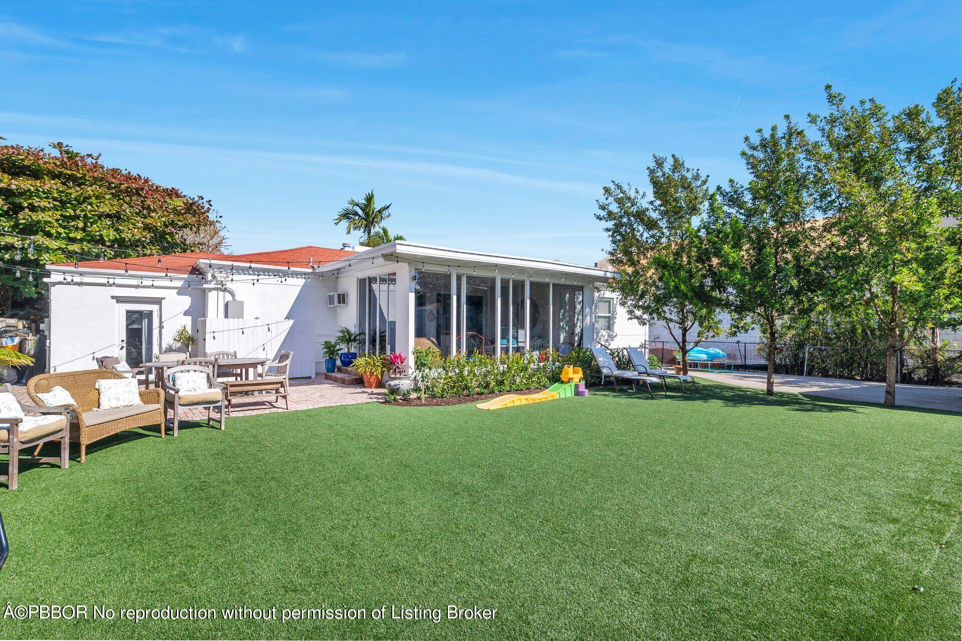 356 Potter Road West Palm Beach, FL 33405 - Photo 22 of 24 a view of a house with a yard and sitting area